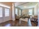 Inviting living room featuring hardwood floors, neutral tones, and an abundance of natural light at 367 Tayside St, Clayton, NC 27520