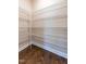 This pantry has white wire shelving with wooden floor at 367 Tayside St, Clayton, NC 27520