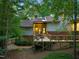 Backyard of this home features a deck and patio area, offering ample space for outdoor living and entertaining at 3910 Somerset Dr, Durham, NC 27707