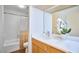 Bathroom with a bathtub/shower combo, neutral finishes, and a decorative orchid adding elegance at 3910 Somerset Dr, Durham, NC 27707