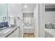 Bathroom view including a bedroom closet with shelving featuring towels at 3910 Somerset Dr, Durham, NC 27707