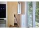 View into a bedroom, with white bedding, from a doorway, in a room with a mounted television at 3910 Somerset Dr, Durham, NC 27707