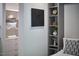 Bedroom closet with shelving and a dresser featuring a variety of folded clothes at 3910 Somerset Dr, Durham, NC 27707