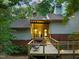 Inviting deck with seating, overlooking a well-manicured yard, perfect for relaxing and entertaining at 3910 Somerset Dr, Durham, NC 27707