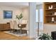 Dining room featuring a wooden table, seating for six, and bright natural light at 3910 Somerset Dr, Durham, NC 27707