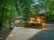 Charming home with a wooden walkway, lush landscaping, and a welcoming exterior at 3910 Somerset Dr, Durham, NC 27707