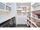 Well-organized laundry room with sleek appliances and ample storage space, making chores a breeze at 3910 Somerset Dr, Durham, NC 27707