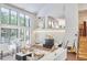 Bright living room with high ceilings, and comfortable seating at 3910 Somerset Dr, Durham, NC 27707