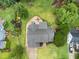 The aerial view highlights the home's roof, landscaping, and proximity to neighboring houses at 3916 Rustic Mill Dr, Apex, NC 27539