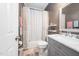 Cozy bathroom featuring a marble vanity and a shower and tub combo at 3916 Rustic Mill Dr, Apex, NC 27539