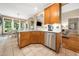 Featuring tile floors and stainless steel appliances, this kitchen is great for prepping meals while entertaining guests at 3916 Rustic Mill Dr, Apex, NC 27539