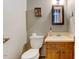 Practical half-bathroom with toilet and small vanity at 4272 Boyd Wright Rd, Burlington, NC 27215