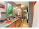 Bathroom with wood cabinets, colorful sinks, and view to outdoors at 4272 Boyd Wright Rd, Burlington, NC 27215