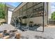 Well-kept backyard boasting a fire pit with chairs and outdoor grill at 4408 Queenstown Ct, Raleigh, NC 27612