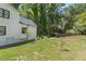 A spacious backyard with lush greenery and established trees at 4408 Queenstown Ct, Raleigh, NC 27612