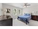 Bedroom with windows and ceiling fan at 4408 Queenstown Ct, Raleigh, NC 27612