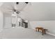 Spacious bonus room includes wet bar and access to bathroom at 4408 Queenstown Ct, Raleigh, NC 27612