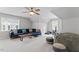 Versatile bonus room with neutral carpet, natural light, and comfortable seating at 4408 Queenstown Ct, Raleigh, NC 27612
