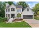 Beautiful two-story home with an attractive, manicured front yard at 4408 Queenstown Ct, Raleigh, NC 27612