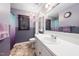 Unique bathroom featuring a chandelier and stylish purple walls at 46 Sparger Springs Ln, Durham, NC 27705