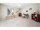 Bright bedroom with neutral walls, ceiling fan, and a large window at 46 Sparger Springs Ln, Durham, NC 27705