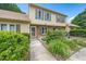 Charming townhome with a landscaped front yard, and a welcoming entrance walkway at 46 Sparger Springs Ln, Durham, NC 27705