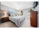 Comfortable main bedroom featuring a beach mural and neutral decor at 46 Sparger Springs Ln, Durham, NC 27705