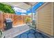 Enclosed patio area with a grill, privacy fence, and stone groundcover at 46 Sparger Springs Ln, Durham, NC 27705