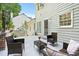Spacious back porch with outdoor furniture, ideal for enjoying the serene views and fresh air at 4705 Royal Troon Dr, Raleigh, NC 27604