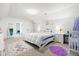 Bright bedroom features plush carpet, stylish furnishings, and a well-lit, inviting atmosphere at 4705 Royal Troon Dr, Raleigh, NC 27604