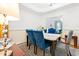Cozy dining area featuring elegant chairs and a table set for a meal at 4705 Royal Troon Dr, Raleigh, NC 27604