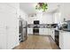Spacious kitchen with stainless steel appliances, modern cabinets, and granite countertops at 4705 Royal Troon Dr, Raleigh, NC 27604