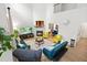 Open-concept living room with ample seating, fireplace, and access to dining area at 4705 Royal Troon Dr, Raleigh, NC 27604