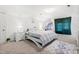 Cozy bedroom featuring plush carpeting, a comfortable bed, and a calming atmosphere at 4705 Royal Troon Dr, Raleigh, NC 27604