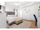 Inviting bedroom with a large bed, soft lighting, and a neutral color palette at 4705 Royal Troon Dr, Raleigh, NC 27604