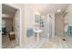 Well-maintained bathroom with a pedestal sink, walk-in shower, and neutral color scheme at 4710 Rollingwood Dr, Durham, NC 27713