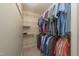 Walk-in closet with ample storage and organization, showcasing a variety of clothing items at 4710 Rollingwood Dr, Durham, NC 27713
