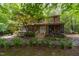 View of a beautiful two-story home with a stone walkway leading to a inviting front door at 4710 Rollingwood Dr, Durham, NC 27713