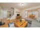 Cozy living room with hardwood floors, comfortable seating, and stair lift at 4710 Rollingwood Dr, Durham, NC 27713