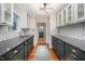 Bright kitchen with sleek countertops, subway tile backsplash, and modern finishes at 4777 Helena Moriah Rd, Rougemont, NC 27572