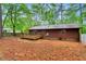 Spacious backyard with a wooden deck, perfect for outdoor entertaining and relaxation at 506 E E St, Butner, NC 27509