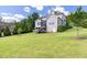Spacious backyard with lush lawn and partial fencing at 5100 Schellinger, Raleigh, NC 27612