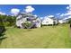Well-manicured backyard with fencing, offering space and privacy at 5100 Schellinger, Raleigh, NC 27612