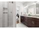 Elegant bathroom with dual vanity, granite countertops, and a luxurious walk-in shower at 5100 Schellinger, Raleigh, NC 27612
