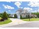 Beautiful home with professional landscaping, mature trees and an attached three-car garage at 5100 Schellinger, Raleigh, NC 27612