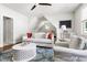 Living room features vaulted ceiling, hardwood floors, and modern decor at 5100 Schellinger, Raleigh, NC 27612