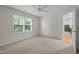 Inviting bedroom with a large window and double closets for ample storage at 552 Stobhill Ln, Holly Springs, NC 27540