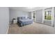 Spacious bedroom with ample natural light and a comfortable bed at 60 Silent Brook Trl, Franklinton, NC 27525