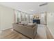 Cozy living room featuring large windows and comfortable seating at 60 Silent Brook Trl, Franklinton, NC 27525
