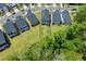 Aerial view of modern homes with large grassy backyards and surrounded by green trees at 6036 Balance Ct, Raleigh, NC 27616